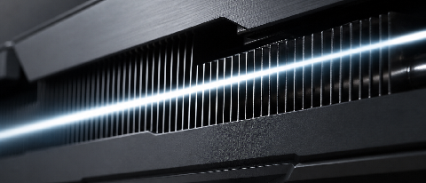 Macro shot of professional GPU cooling architecture with a streak of light symbolizing speed.