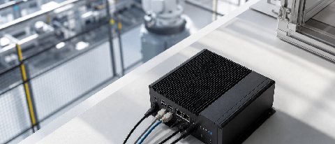 A sleek, minimalist server rack in a clean industrial setting representing edge computing infrastructure.