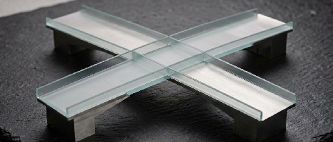 A conceptual editorial image showing a bridge connecting abstract digital nodes to a structured physical office environment
