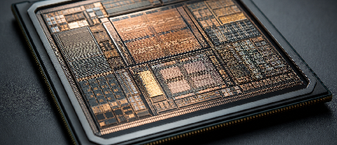Macro photograph of an advanced multi-sector system-on-chip, symbolizing modern heterogeneous computing and system integration.