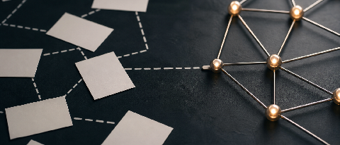 Editorial still life of two intersecting search paths: a grid of scattered document cards and a clean network of connected nodes on a desk.