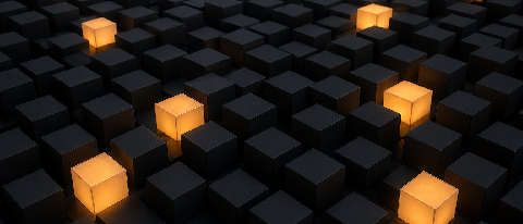 A vast grid of matte grey cubes with a few selectively glowing amber cubes.