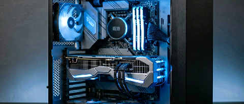 A sleek, modern desktop computer setup with an RTX 4090 graphics card visible, bathed in cool blue ambient light, symbolizing local AI processing power.