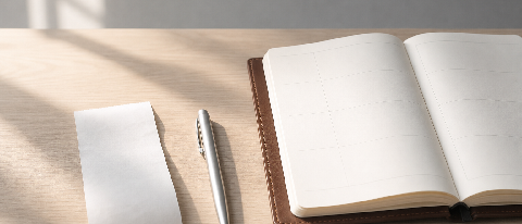 A minimalist desk scene showing an automated workflow in progress, with a receipt and calendar subtly integrated into the environment without screens or text.