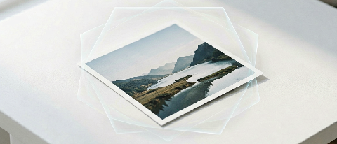 A pristine, high-resolution photograph on a clean desk, protected by a subtle, transparent digital shield overlay, symbolizing verified content integrity.