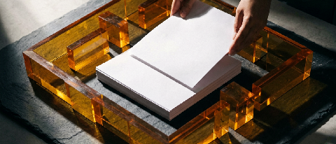 A conceptual editorial image showing a sleek business document navigating a complex maze of red tape and shifting barriers, symbolizing regulatory compliance ch