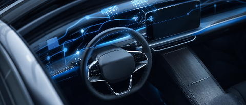 A split composition showing a driver's hand near a steering wheel on one side and a digital data stream on the other, symbolizing the transfer of control and li