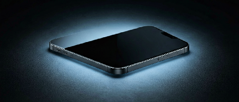 A sleek, modern smartphone resting on a dark surface, emitting a soft, contained blue glow that illuminates only the immediate area, symbolizing local data proc